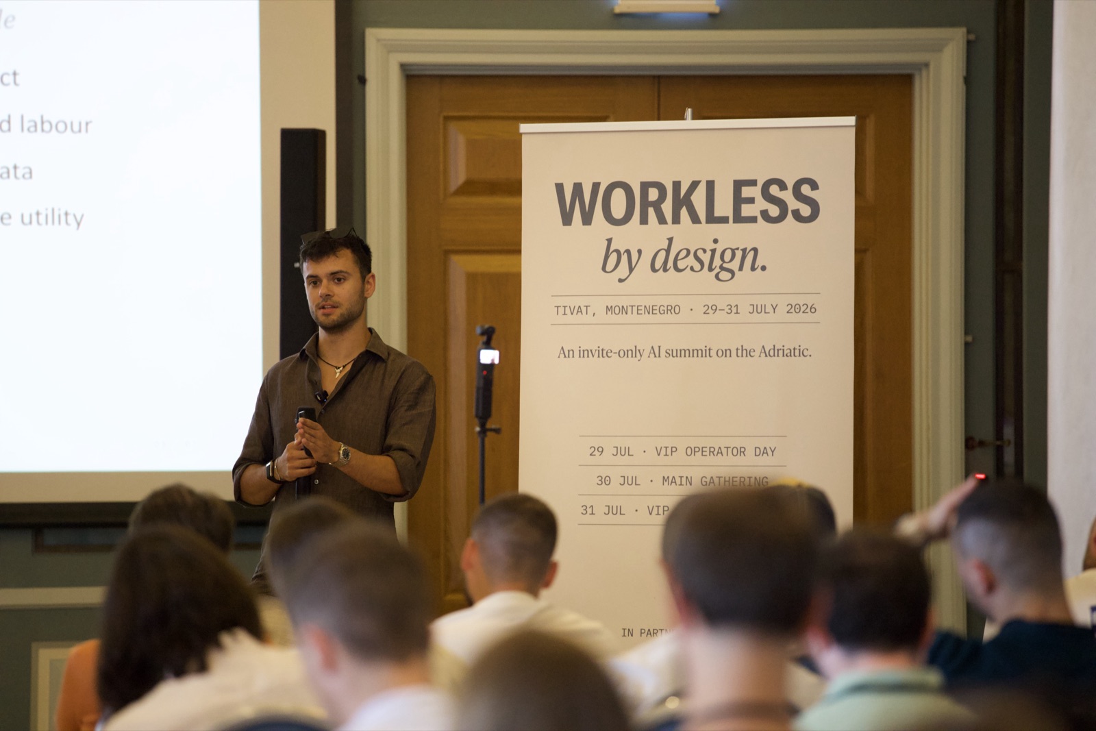 Ethan Monkhouse talking to a full room